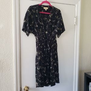 Black silk kimono inspired dress with cream-colored origami crane pattern